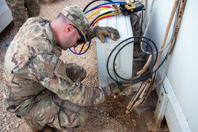 U.S. Air Force Senior Airman German Benmelej, a heating, ventilation, air conditioning and refrigeration specialist assigned to the 332nd Expeditionary Civil Engineering Squadron, 